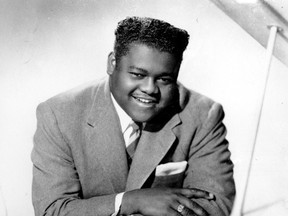 This 1956 file photo shows singer, composer and pianist Fats Domino. He died Tuesday, Oct. 24, 2017, at the age of 89.  (AP Photo, File)