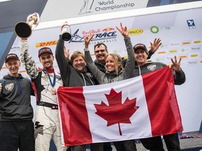 Pete McLeod celebrates with his team during the World Championship Award Ceremony at the eighth round of the Red Bull Air Race World Championship at Indianapolis Motor Speedway. (Joerg Mitter/Red Bull Content Pool)