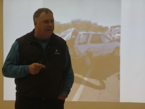 Grant Aune, a retired RCMP sergeant, presented to Hilltop High School about driver safety on Oct. 17 (Joseph Quigley | Whitecourt Star).