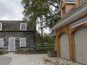 Funding is being sought for a project to replace a deteriorating log cabin at the Children's Animal Farm at Sarnia's Canatara Park, shown here next to a carriage house replaced recently. This week, the log cabin project received $30,000 from the Judith and Norman Alix Foundation. (Paul Morden/Sarnia Observer)