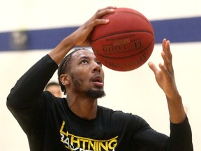 Marcus Capers goes up for a layup during a Lightning practice at the Central YMCA in London, Ont. on Tuesday October 17, 2017.  (MIKE HENSEN, The London Free Press)