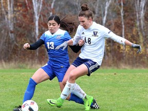 Sierra Clancy of the Ryerson Rams and Laurentian Voyageurs Sarah Sanford  battle for the ball during OUA women playoff soccer action in Sudbury, Ont. on Wednesday October 25, 2017. Gino Donato/Sudbury Star/Postmedia Network