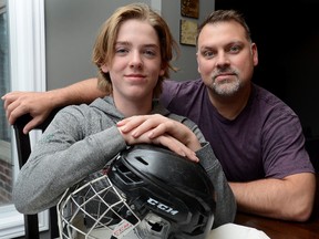 Trevor Gallant and his son Tage, 13, a player on the London Junior Knights minor-bantam AAA team, at their London home on Wednesday October 25, 2017. Tage Gallant has just returned to the ice after suffering a concussion.
MORRIS LAMONT/THE LONDON FREE PRESS /POSTMEDIA NETWORK