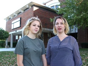 Alliya Cleveland, 14, is pictured with her mom recently outside Great Lakes Secondary in Sarnia. Elisha Cleveland is arguing police and the school should have done more after her daughter was in a fight at the school. She's since switched schools. (Tyler Kula/Sarnia Observer)