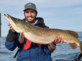 Ottawa angler Eric Riley caught and released this northern pike, measuring more than 40 inches, in Lake Ontario. (Submitted photo)