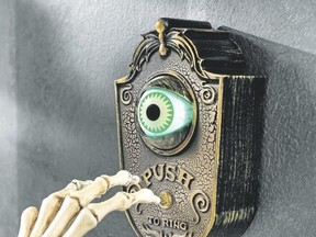 A vintage style doorbell keeps an eye out ? literally ? for Halloween guests. The ghoulish green animated eyeball pops open when the button?s pushed, welcoming guests with one of four greetings. (Photo by www.grandinroad.com/via AP)