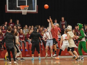 They did the mash, they did the Monster Mash – as costumed students competed against dressed up teachers in the Frontenac Secondary Schools 19th annual fundraising basketball game in Kingston on Thursday. (Julia McKay/The Whig-Standard)