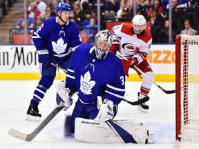 Toronto Maple Leafs goalie Frederik Andersen (31) reacts after giving up a goal to Carolina Hurricanes right wing Josh Jooris (not shown) during third-period NHL hockey action in Toronto, Thursday, Oct. 26, 2017. (Frank Gunn/The Canadian Press via AP)