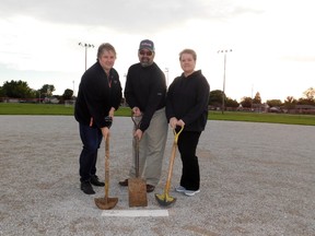 Michelle, Grant and Kim at the ball diamond. The Langlois siblings took the pitcher’s rubber home after an emotional gathering and ceremony, to honour the life and death of their father Simon “Sy” Langlois. (Kathleen Smith/Goderich Signal Star)