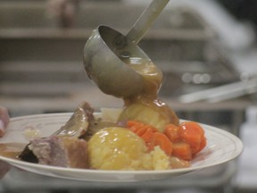 A traditional Newfoundland meal gets served for the 7th annual Jiggs Dinner at the St. Patrick Anglican's Church on Oct. 21. The meal features salt beef, roast beef, mashed potatoes and vegetables (Joseph Quigley | Whitecourt Star).
