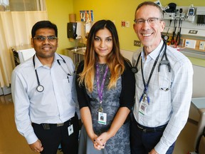 Luke Hendry/The Intelligencer
Drs. Janarthanan Kankesan, Negar Chooback and Roger Levesque gather in the cancer clinic at Belleville General Hospital Friday. Chooback's arrival means the team can now treat more local patients, preventing some from having to travel outside the region.
