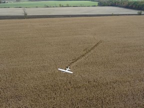 A pilot was uninjured after he made an emergency landing Thursday night in a cornfield near Petrolia. The pilot used a flashlight to alert St. Clair Township firefighters who were looking for him. (Supplied)