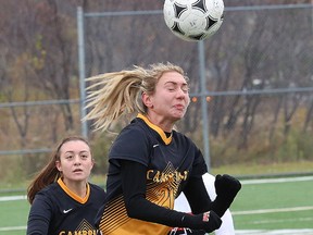 Jenna Schroeder, of Cambrian Golden Shield, heads the ball during soccer action against the Mohawk Mountaineers at the OCAA women's championship tournament at James Jerome Sports Complex in Sudbury, Ont. on Friday October 27, 2017. John Lappa/Sudbury Star/Postmedia Network