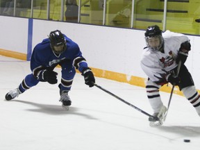 Hawks midget player Blake Doell in the opposing team’s zone before attempting a goal during the first period in their game against Bassano Outlaws Saturday, Oct. 28 at the Vulcan District Arena.