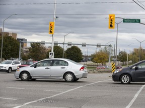 The intersection of Commissioners and Wellington roads is routinely one of the busiest in the city. Help may be on the way, in the form of ?smart? signals. (DEREK RUTTAN, The London Free Press)