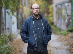 Author Sean Michaels poses for a photograph outside his home in Montreal on Friday. (Graham Hughes/Canadian Press)