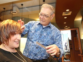 Hairstylist Frank Marasco works on client Sonia Fratin's on Sunday. Marasco recently judged the Wella Professionals 2017 North America Trend Vision Awards in England. (Gino Donato/Sudbury Star)