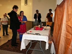 During Sunday's Deepavali (also known as Diwali) celebrations, guests were guided through yoga poses, energy breathing, and meditation and relaxation techniques. Following words from guest speakers from the Huron County community, Smita Patel led the group in a light & fire ceremony.