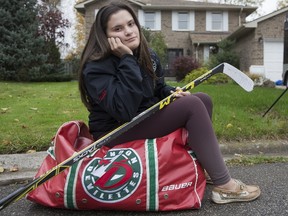 Olivia Vigars 14, a hockey player and student at Monseigneur-Bruyere secondary school could be playing on the school?s girls? team after the French Catholic school board came up with money to fund it again this year. (DEREK RUTTAN, The London Free Press)