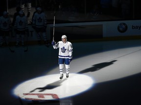 Toronto Maple Leafs centre Patrick Marleau raises his stick to the crowd as he is honored before an NHL hockey game against the San Jose Sharks, his former team, Monday, Oct. 30, 2017, in San Jose, Calif. (AP Photo/Marcio Jose Sanchez)