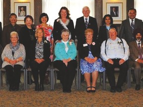 Pictured above are members of the Drayton Valley Health Care Auxiliary posing for a group photograph with Seniors’ and Housing Minister Lori Sigurdson after the group received a seniors service award.  -- Submitted photograph