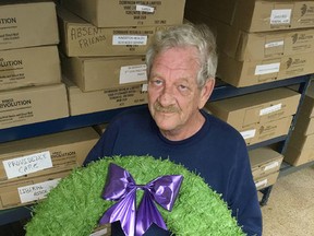 Elliot Ferguson/The Whig-Standard
Merle Gooderham, chair of the Poppy Campaign in Kingston, holds one of the wreaths that is to be placed at the cenotaph on Remembrance Day. The annual poppy campaign is gearing up ahead of Nov. 11.