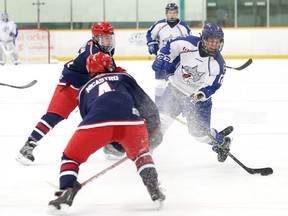 Glenn Therrien, right, of the Sudbury Nickel Capital Wolves, fires a shot on net during midget hockey action against the Clarington Toros at the Big Nickel Hockey Tournament at the Gerry McCrory Countryside Sports Complex in Sudbury, Ont. on Friday November 4, 2016. John Lappa/Sudbury Star/Postmedia Network