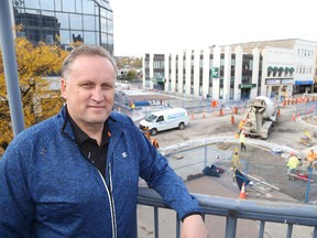 Jason Miller/The Intelligencer 
Rod Bovay, city director of engineering, stands on the second-floor of Century Village overlooking ongoing downtown revitalization.