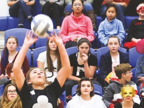 Hawk Bailey Steiner sets the ball during County Central High School’s game against the Coalhurst Trojans Friday at the Cultural-Recreational Centre. Jasmine O’Halloran Vulcan Advocate