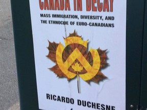St. Andrew's United Church is dismayed by the appearance of posters like this one, expressing a far-right, anti-immigration message, in the downtown core. Supplied photo