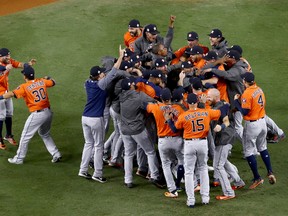 LOS ANGELES, CA - NOVEMBER 01: The Houston Astros celebrate defeating the Los Angeles Dodgers 5-1 in game seven to win the 2017 World Series at Dodger Stadium on November 1, 2017 in Los Angeles, California. (Photo by Tim Bradbury/Getty Images)  World Series - Houston Astros v Los Angeles Dodgers - Game Seven