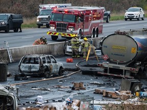 A fatal vehicle pileup north of Toronto that closed a stretch of highway in both directions south of Barrie, Ont. is shown on Wednesday, November 1, 2017. THE CANADIAN PRESS/Christopher Katsarov ORG XMIT: CKL104