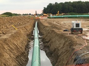 Union Gas has completed its $264-million pipeline expansion from its gas plant in Dawn-Euphemia to an installation in Dover Township. The pipeline is 41 kilometres in length and during construction as many as 600 workers were employed in its construction. The photograph was taken this past summer near Tupperville.