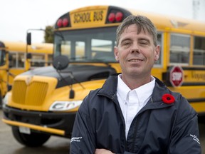 Jason Andress drives a school bus for Voyageur Transportation Services in London, which pays drivers $13 to $17 an hour. (DEREK RUTTAN, The London Free Press)