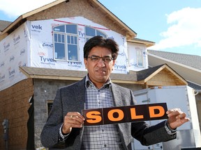 Toronto area real estate agent Pravin Patel, in the Woodhaven subdivision in the west end of Kingston on Friday November 3 2017, has sold over 300 Kingston homes to out of town investors. Ian MacAlpine /The Whig-Standard/Postmedia Network