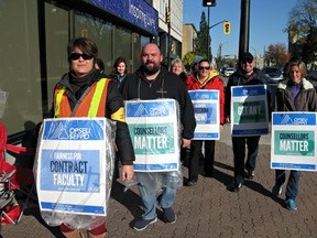 Faculty from Conestoga and Mohawk colleges picket in downtown Brantford on Thursday, Oct. 26, 2017. (Postmedia Network)