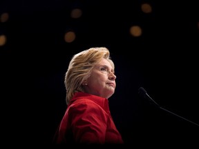 In this July 30, 2016 file photo, U.S. Democratic presidential candidate Hillary Clinton pauses while speaking at a rally in Pittsburgh during a bus tour through the rust belt. (Andrew Harnik/AP Photo/Files)