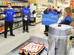 With cupcakes and coffee in the foreground, Perth-Wellington MP John Nater (left) addresses the crowd at Walkom’s valu-mart during Random Acts of Kindness Day Nov. 3. Also pictured is West Perth Mayor Walter McKenzie, Chris Ritz of valu-mart (holding sign) and Tracy Van Kalsbeek (right), of the Stratford Perth Community Foundation. ANDY BADER/MITCHELL ADVOCATE