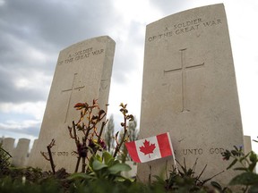 A Canadian flag sits in front of a headstone at Tyne Cot Cemetery in Zonnebeke, Belgium. This year marks 100 years since the bloody First World War Battle of Passchendaele, that saw approximately 325,000 Allied troops and 260,000 Germans killed.
Handout/Postmedia Network