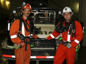 Kidd Operations mine rescuer Keiran Swanton, left, and incident commander Iain McKillip were recently training on the company’s new rescue vehicle, one than can fit easily onto the main cage, allowing mine rescuers to rush to any area of the mine more quickly.