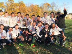 The Nicholson Crusaders senior boys soccer team celebrates its recent COSSA A championship victory in Trenton, vaulting them to the OFSAA tournament next June in Fort Erie. (Submitted photo)