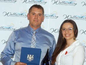 Serkka Farms' Kurtis Allaer accepts the Agricultural Award from sponsor Gemma Peters of UCB Radio, at the Wallaceburg and District Chamber of Commerce Business and Community Excellence Awards held on Thursday, Nov. 2, at the CBD Club.