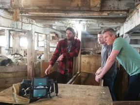 Andrew Younghusband (right) with Kyle Murray (left) and Jake Murray at Topsy Farms during filming of an episode of the Discovery Channel program “Tougher Than It Looks”. The episode will air on Monday, Nov 13. SUPPLIED PHOTO.