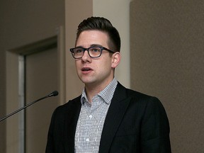 Jordan Friesen, national associate director for Workplace Mental Health at the Canadian Mental Health Association, speaks to a group at the Donald Gordon Conference Centre on Tuesday. (Ian MacAlpine/The Whig-Standard)