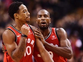 Toronto Raptors guard DeMar DeRozan (10) celebrates a basket against the Chicago Bulls with forward Serge Ibaka (9) during second half NBA basketball action in Toronto on Tuesday, November 7, 2017. (THE CANADIAN PRESS/Frank Gunn)