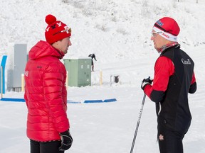 Ivan Babikov, World Cup team coach, talks to Knute Johnsgaard, on the men’s national cross-country ski team, races at the Frozen Thunder sprints at the Canmore Nordic Centre on Wednesday, November 1, 2017. photo by Pam Doyle/www.pamdoylephoto.com