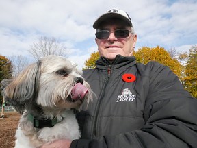 Bob Wass and his dog, Benji, were among the first to try out Tillsonburg's new dog park in Memorial Park Friday morning. (Chris Abbott/Tillsonburg News)