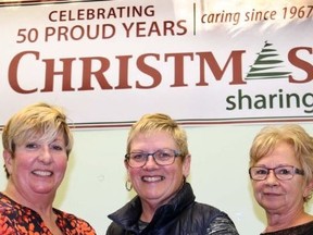 TIM MEEKS/THE INTELLIGENCER
Volunteer Lynn Rainey, Pam Smith, co-ordinator of the Christmas Sharing Program, and board chairwoman Nancy Roberts are expecting the 50th year for the program will be the busiest yet. Registrations for the program, which helps families in need during the holidays, began November 1 and runs until November 30.