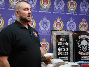 Ash Gutheinz, Crime Stoppers Coordinator for Kingston and the 1000's Islands, at with different forms of contraband cigarettes at Kingston Police headquarters in Kingston, Ont. on Wednesday November 8, 2017. Steph Crosier/Kingston Whig-Standard/Postmedia Network