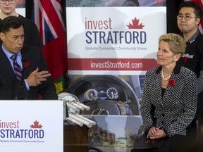 Brad Duguid the Minister of Economic Development and Growth introduces Ontario Premier Kathleen Wynne during an $80 million announcement in Stratford. (MIKE HENSEN, The London Free Press)